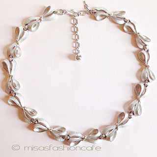 （画像用） Ｔｒｉｆａｒｉ　 トリファリ 銀のリボン・ネックレス